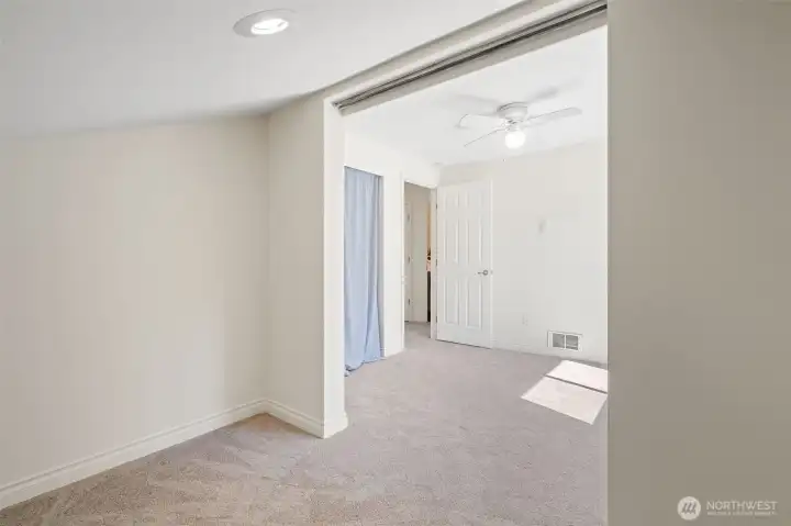 Looking out from extra space into second bedroom.