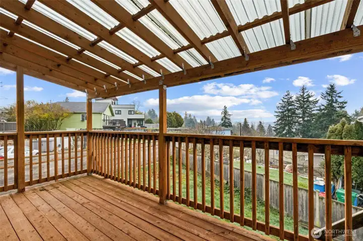 Newer back deck located just off the kitchen makes outdoor entertaining easy.