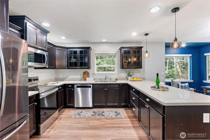 Spacious Kitchen with Solid Stone Countertops & SS appliances
