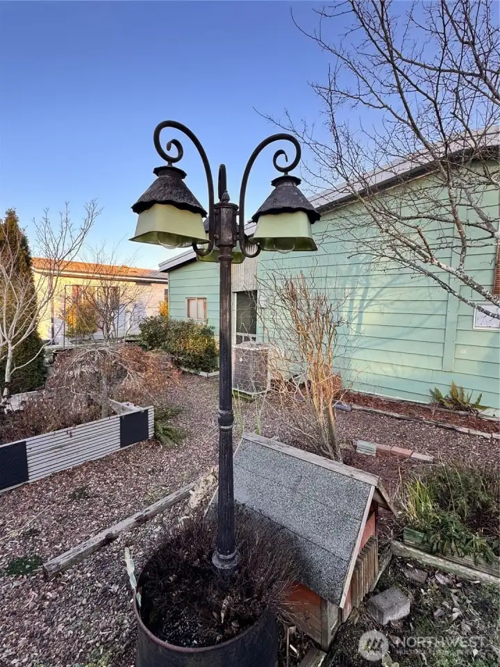 Beautiful lamp conveys in the garden