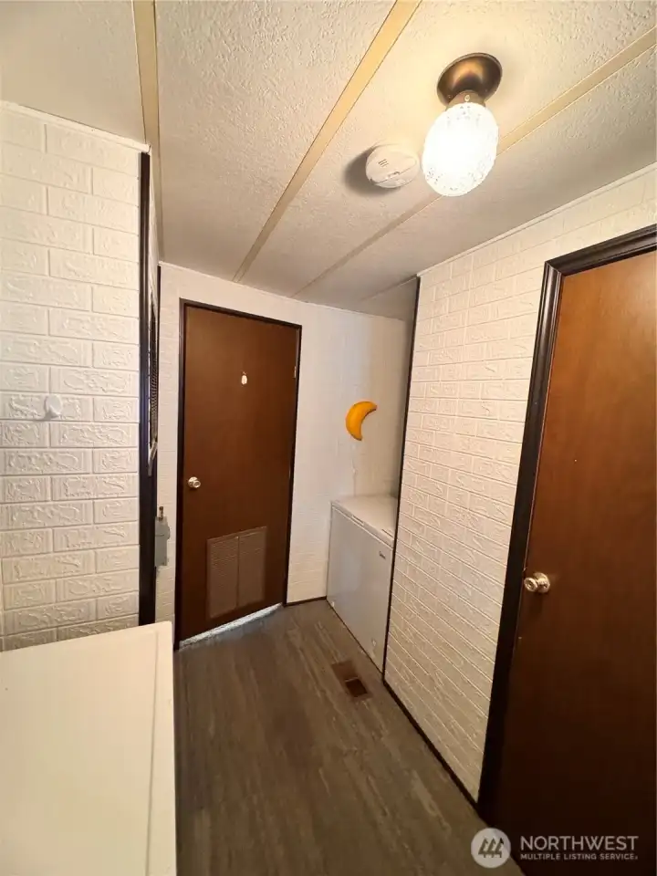 Behind the door has space for a chest freezer! Behind the door has space for a chest freezer!