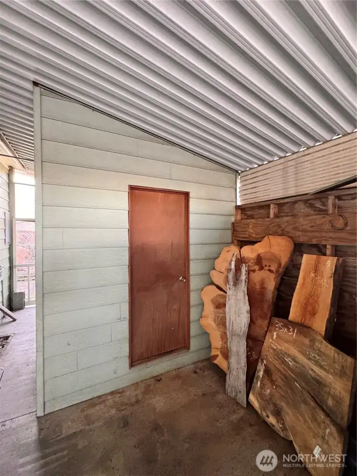 Extra storage in the carport. Extra storage in the carport.