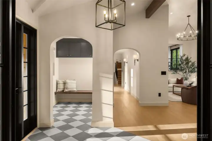 Natural stone tile entryway & Mudroom right off the entry