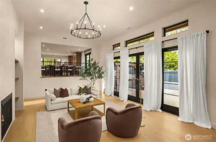 Fully retractable glass doors open the home to seamless indoor-outdoor living