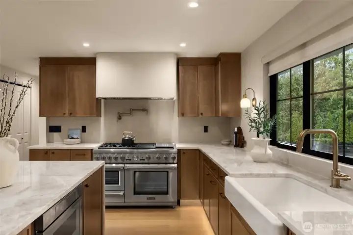 Appointed with a luxury Thermador appliance suite countertops