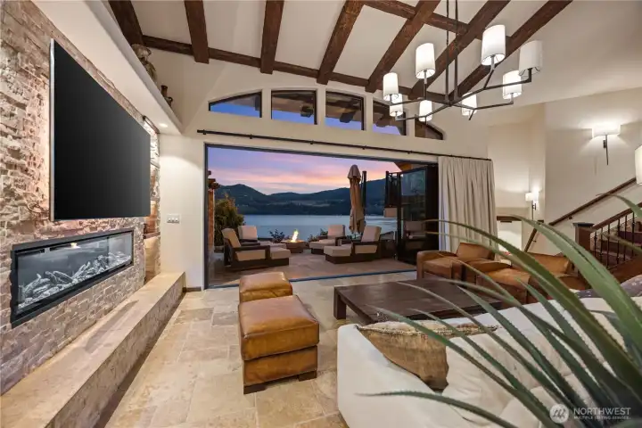 Spacious living room designed to maximize natural light and lake views.