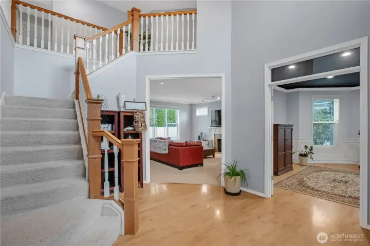 foyer with vaulted ceiling and lots of natural light