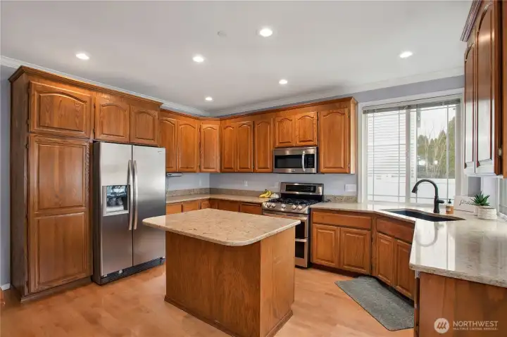 large kitchen with tons of cabinetry and countertop space