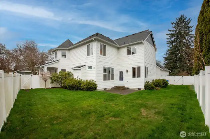 large backyard with sprinkler system