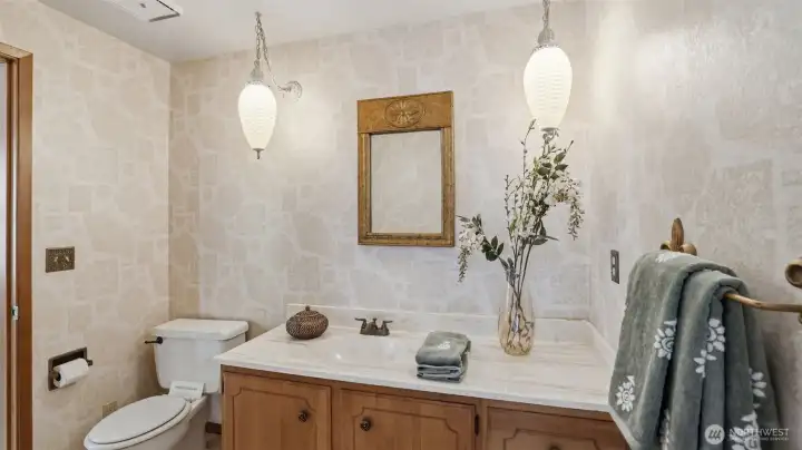 Main level guest bathroom that connects to main level bedroom.