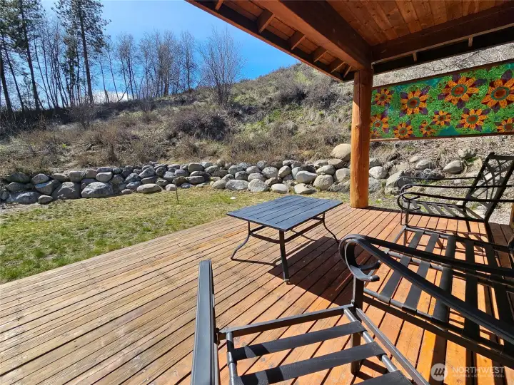 Beautiful outdoor hang zone from this end unit