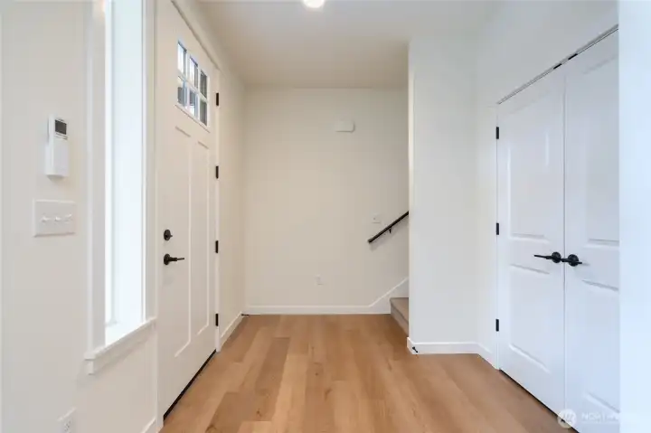 Entrance and hallway closet - Pics are of a different 1663 plan. Features and colors may differ.