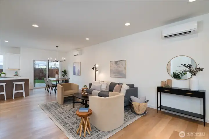 Open living and dining area - Pics are of a different 1663 plan. Features and colors may differ.