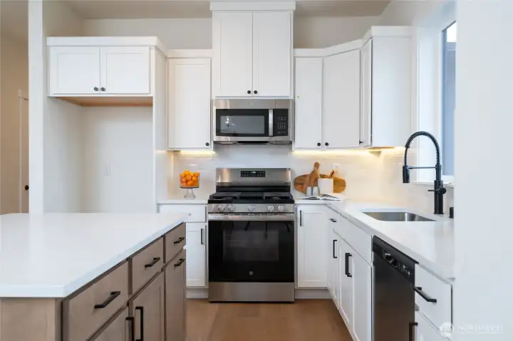 Kitchen - Pics are of a different 1663 plan. Features and colors may differ.