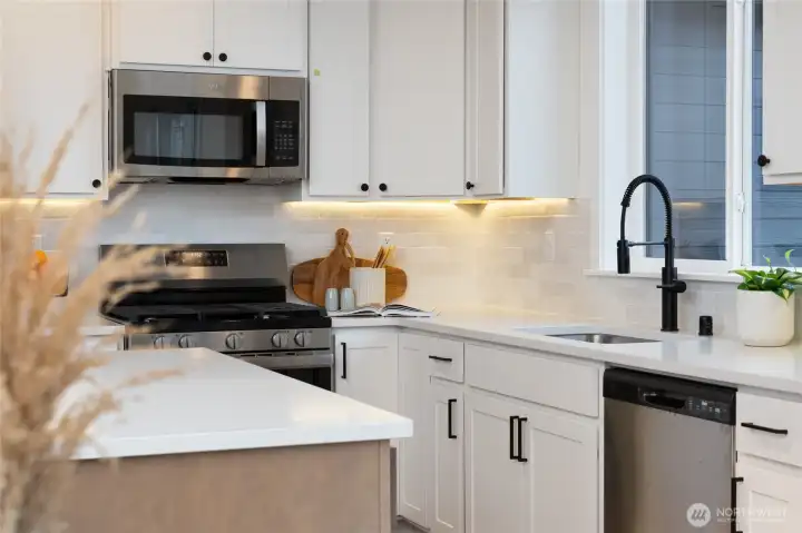 Kitchen - Pics are of a different 1663 plan. Features and colors may differ.