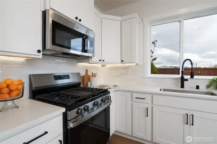 Kitchen - Pics are of a different 1663 plan. Features and colors may differ.