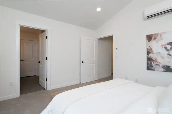Upstairs primary bedroom - Pics are of a different 1663 plan. Features and colors may differ.