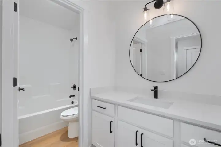 Upstairs Guest Bathroom - Pics are of a different 1663 plan. Features and colors may differ.