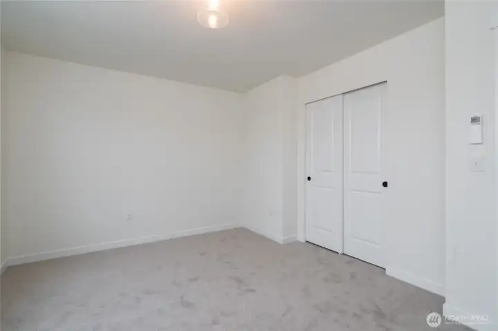 Upstairs Guest Bedroom - Pics are of a different 1663 plan. Features and colors may differ.
