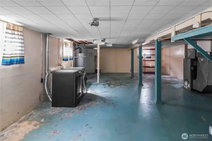Unfinished basement with laundry