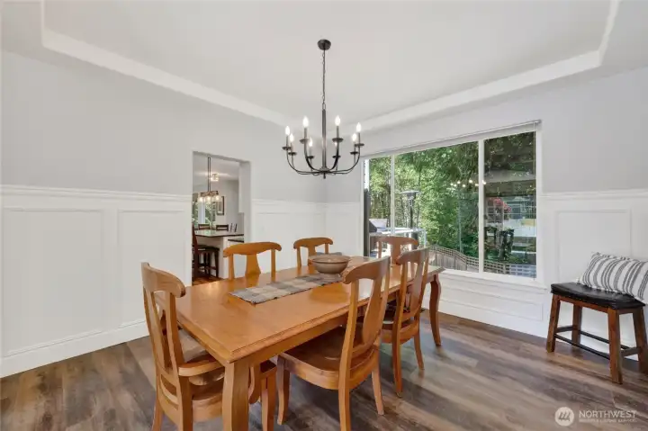 Good sized dining room, window looking to back deck and yard. Wainscoting, tray ceilings and new light fixtures compliment dining space.