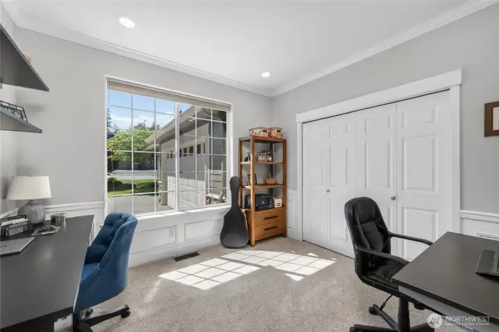 Light and bright main floor office with great storage and glass French doors.