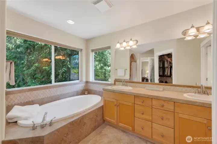 Dual vanities in primary bathroom.