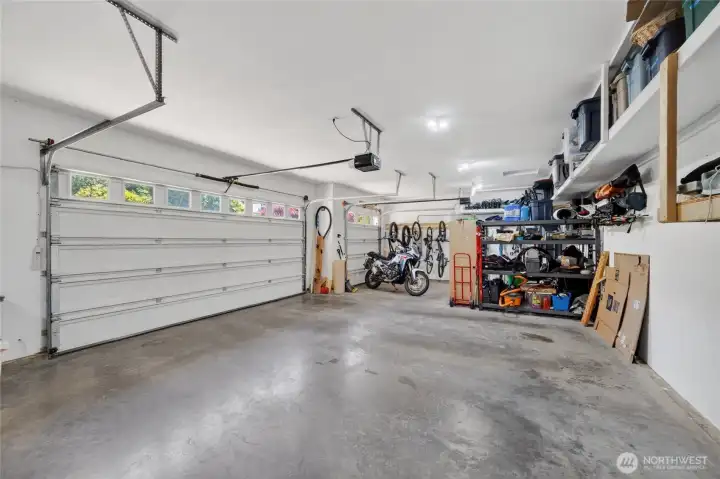 Oversized three car garage is extra deep and ready for all your toys and treasures.