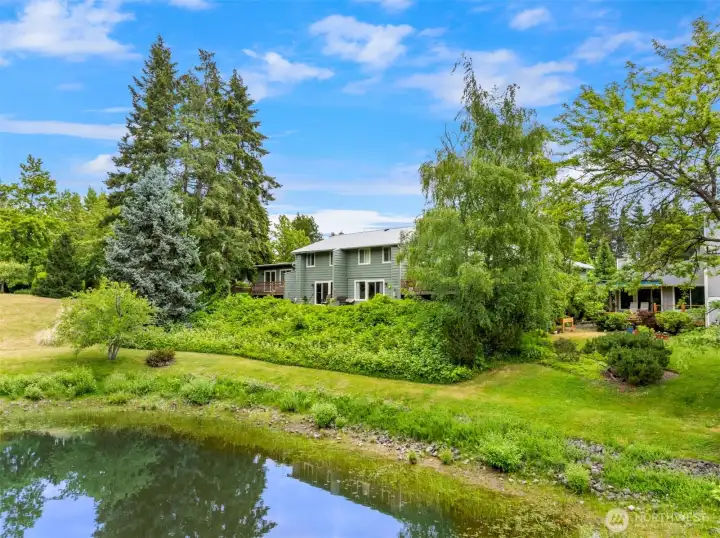 The back deck has a great view of the pond and surrounding greenery.
