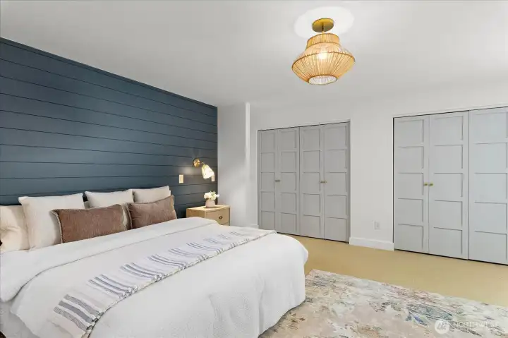 Primary bedroom with lots of closet space Primary bedroom with lots of closet space