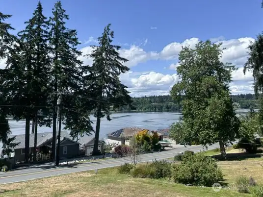 your view from the upper walkway and windows. this is the adjoining parcel your view from the upper walkway and windows. this is the adjoining parcel