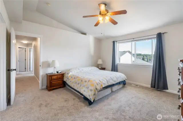 Primary bedroom with vaulted ceiling upstairs