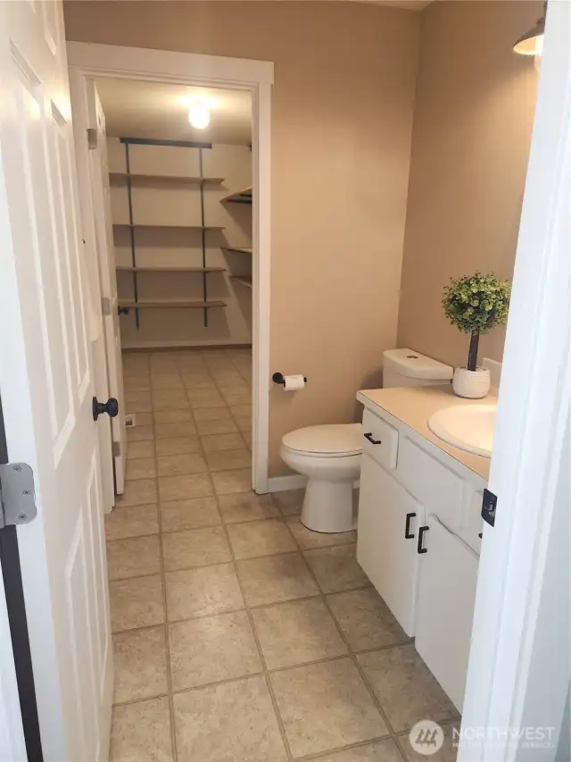 Half bath with entrance to laundry room