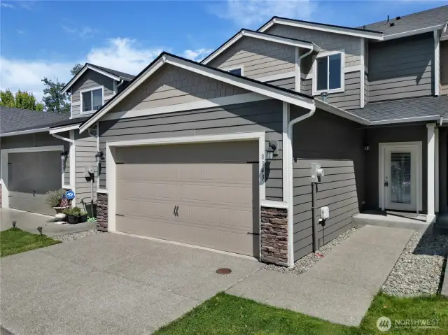 Back entrance, garage and driveway