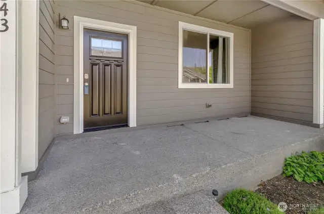 Large covered front patio and entrance