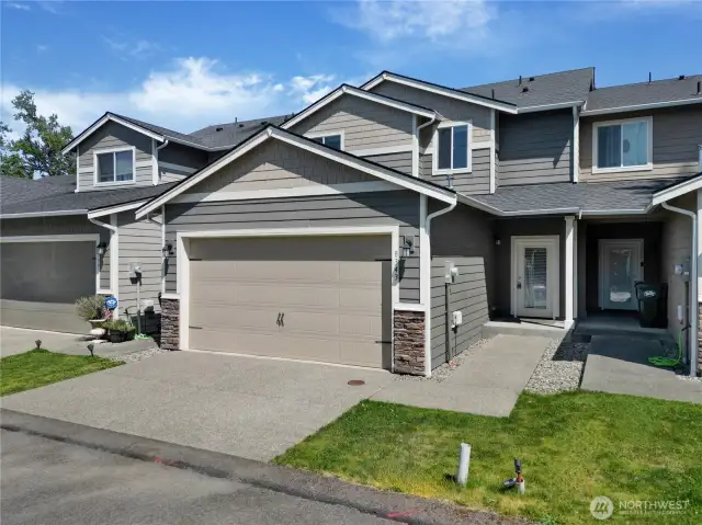 Back entrance, driveway, garage