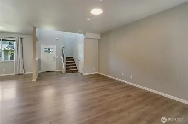Dining to the left, front door and living room