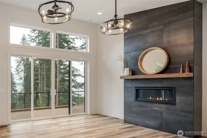 Extra windows for more view and more light.   Slate look fireplace with propane fireplace.