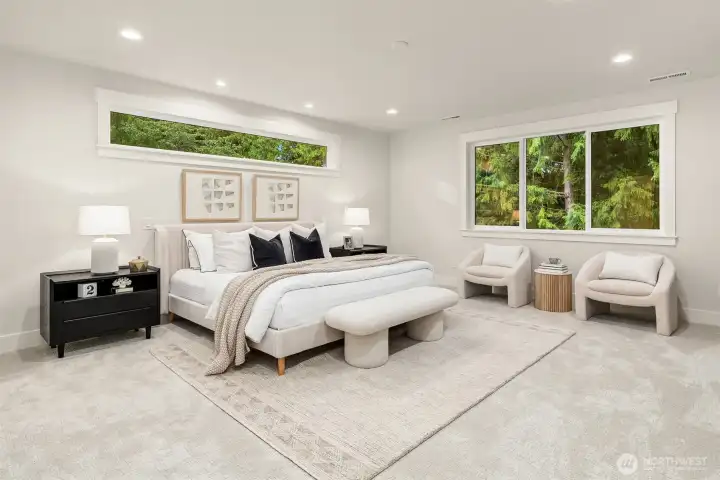 Primary bedroom suite with its own sitting area.