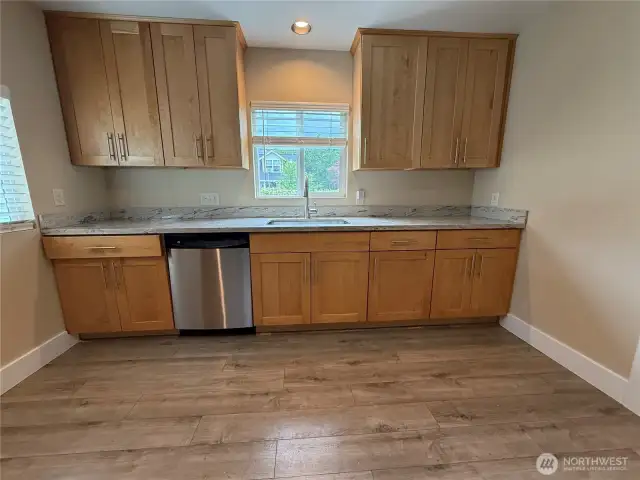 New cabinets, floors, appliances.