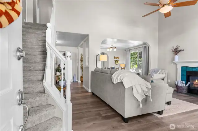 Entry with soaring ceilings and brand-new vinyl flooring