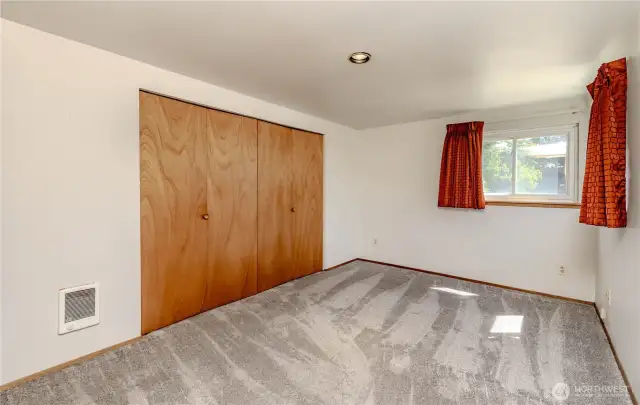 Primary bedroom.  Hardwood underneath.