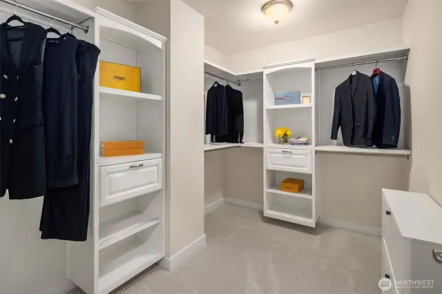 Built in closet system in primary bedroom