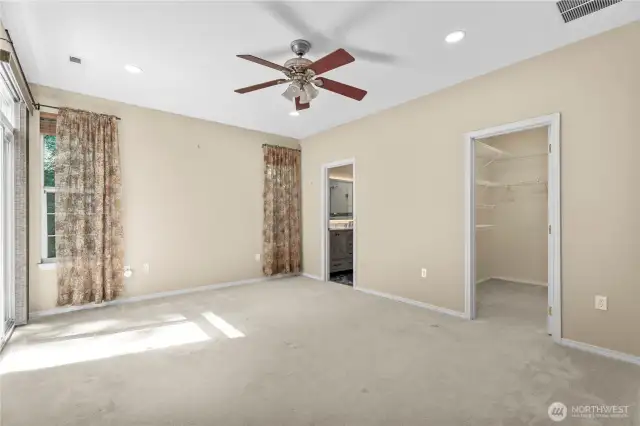 Elegant Main Floor Living. Step into the inviting main floor, where you’ll find the spacious primary suite thoughtfully designed for comfort and privacy.