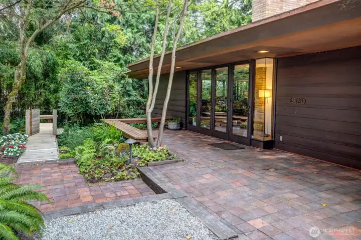 Front entry and private dock over Thornton Creek