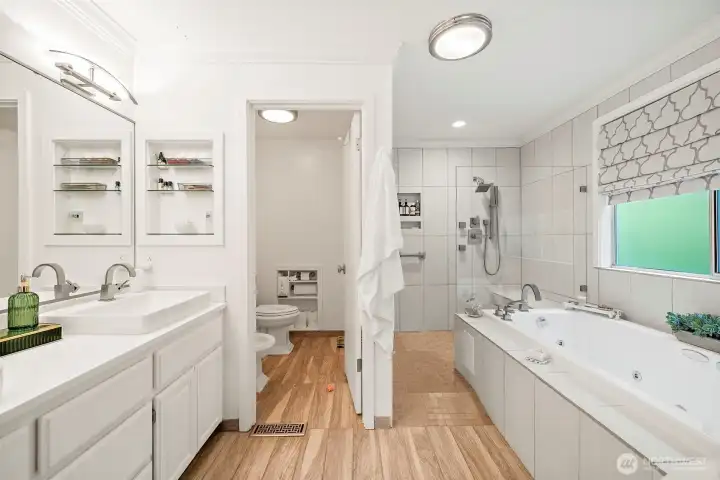 Primary suite bath with relaxing jetted tub