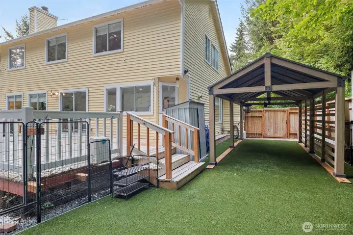 Pet friendly turf with a covered dog run