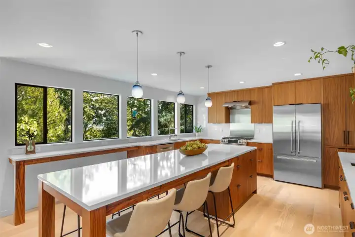 Completely overhauled in 2021, the open chef's kitchen maintains the clean midcentury lines all with the pleasing aesthetic of today's tastes.