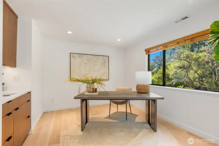 Bedroom Suite #1 with 3/4 bath and adjoining office/sitting room. Multigenerational living option.