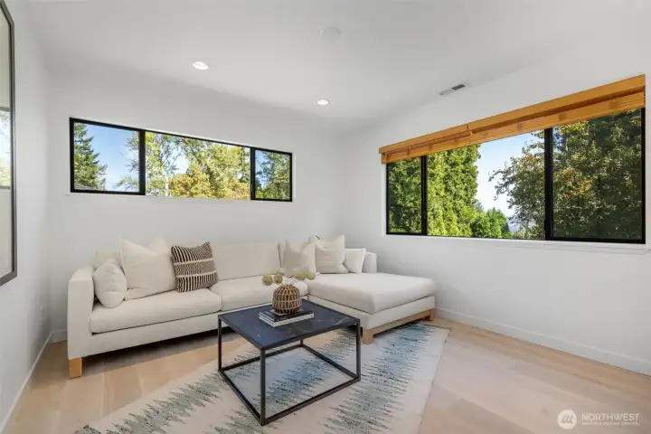 Bedroom Suite #3 with walk in closet, spa-like full bath and adjoining office/sitting room with views.